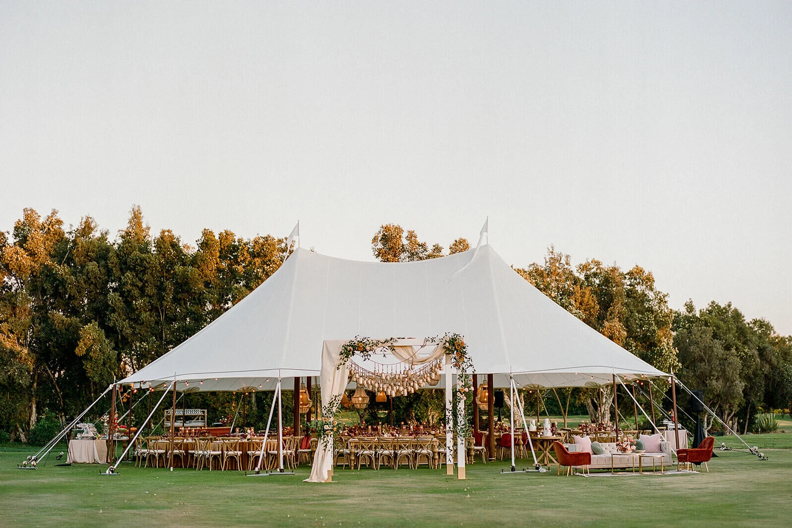 Golf Course Wedding Venues: A tent reception area at a wedding in Carlsbad, California.