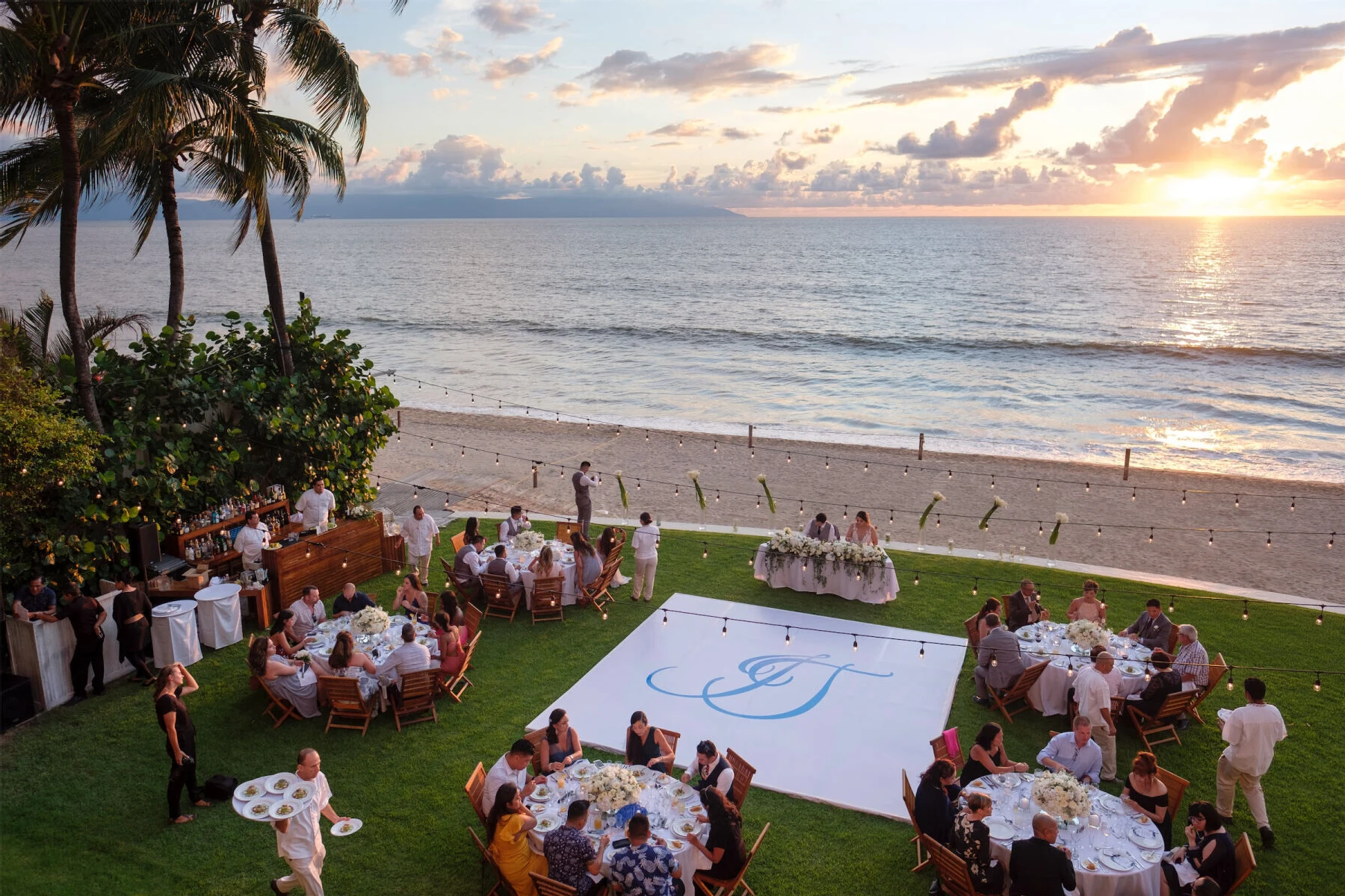 Grand Velas Riviera Nayarit: A wedding reception featuring a dance floor with the bride and groom's initials.