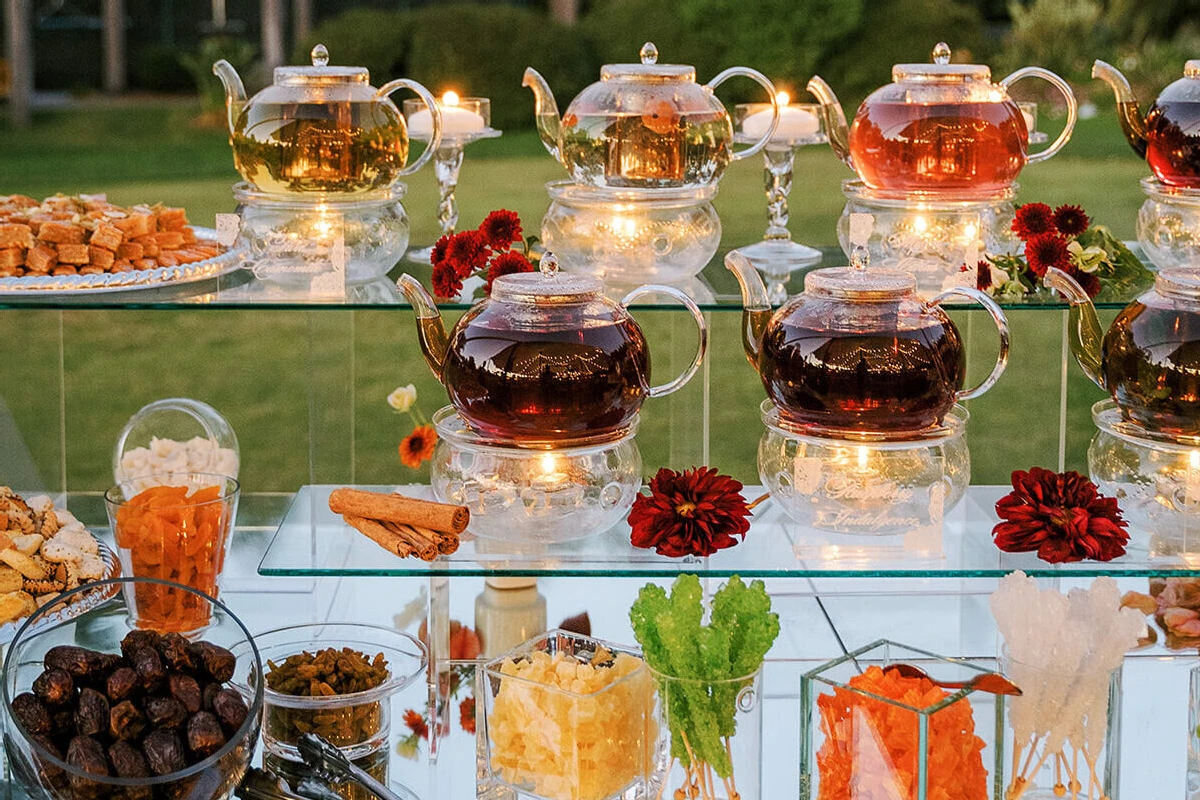 An elegant display of teas at an earth tone wedding reception.