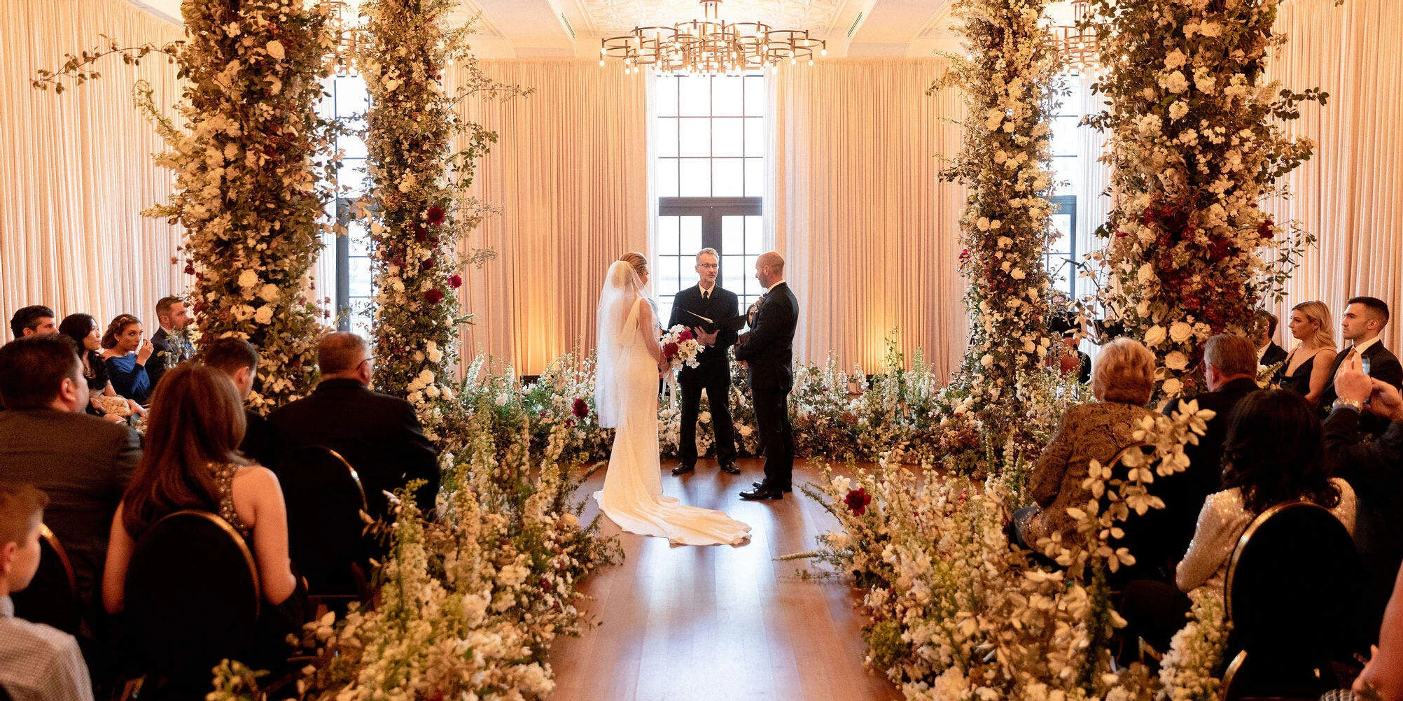 A floral-filled ceremony-in-the-round at the Shinola Hotel in Michigan.