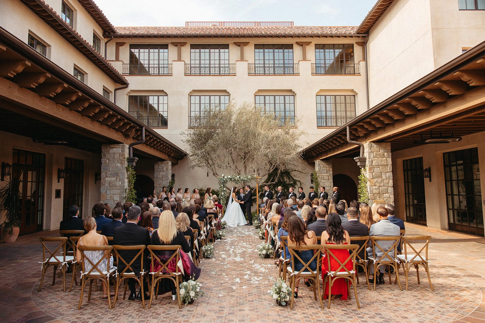 Marriott Weddings: An outdoor ceremony setup at a Spanish style hotel's courtyard in Southern California.