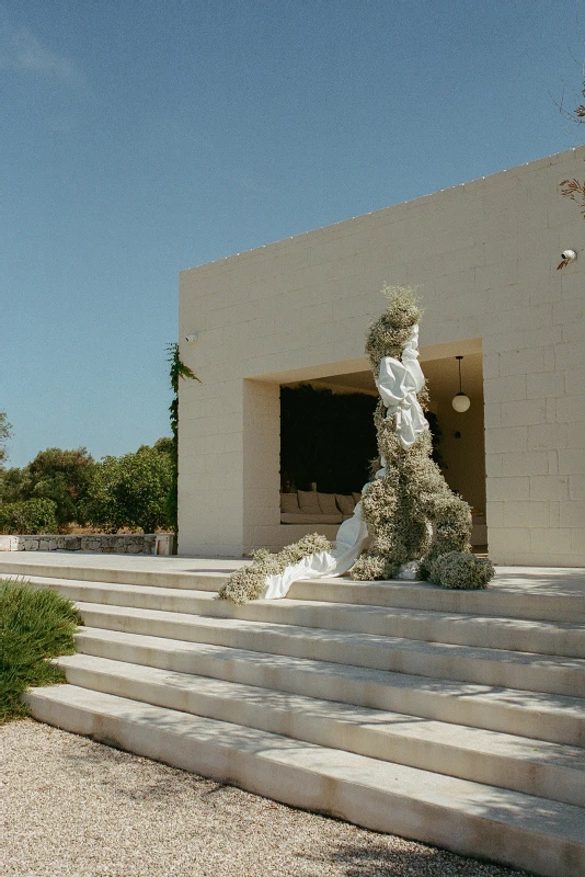 An Architectural Mediterranean Wedding with Fabric-Draped Florals
