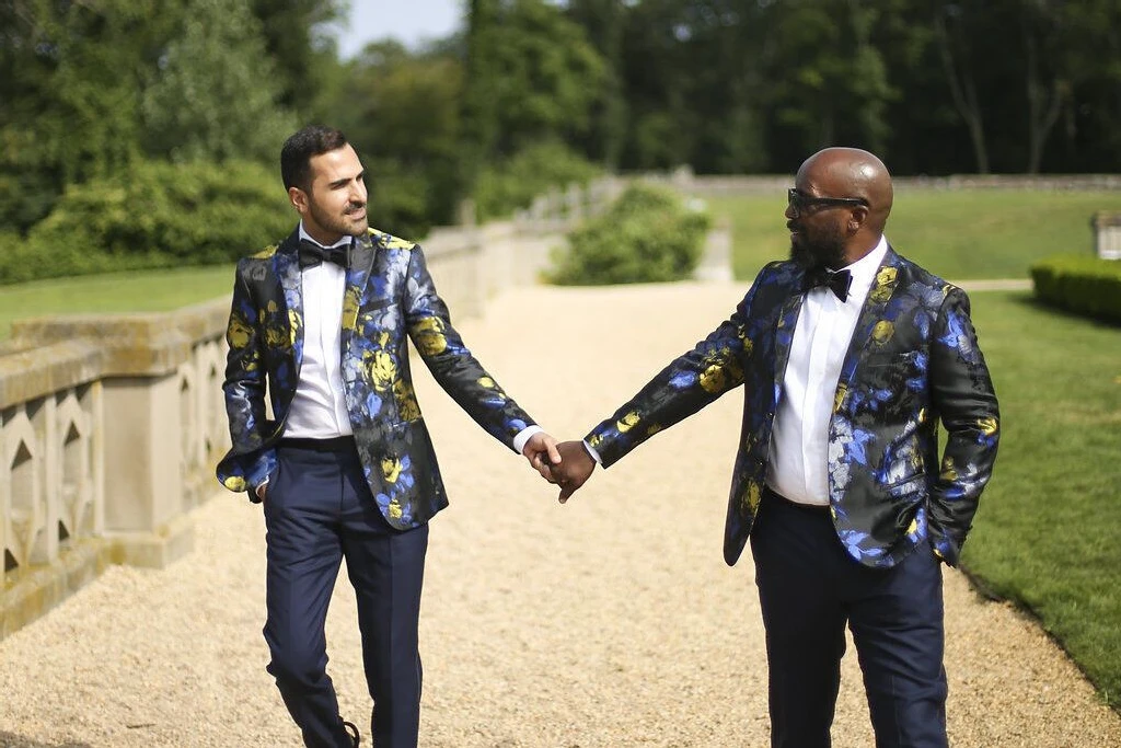 See more vibrant patterned jacket tuxedo groom attire from Mica and Dom's formal wedding