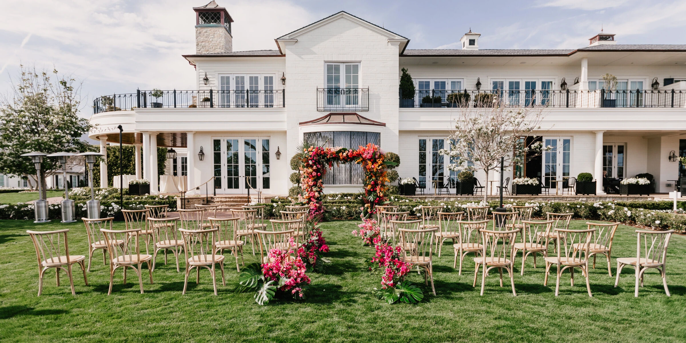 A wedding ceremony setup at Rosewood Miramar Beach, a venue in California.