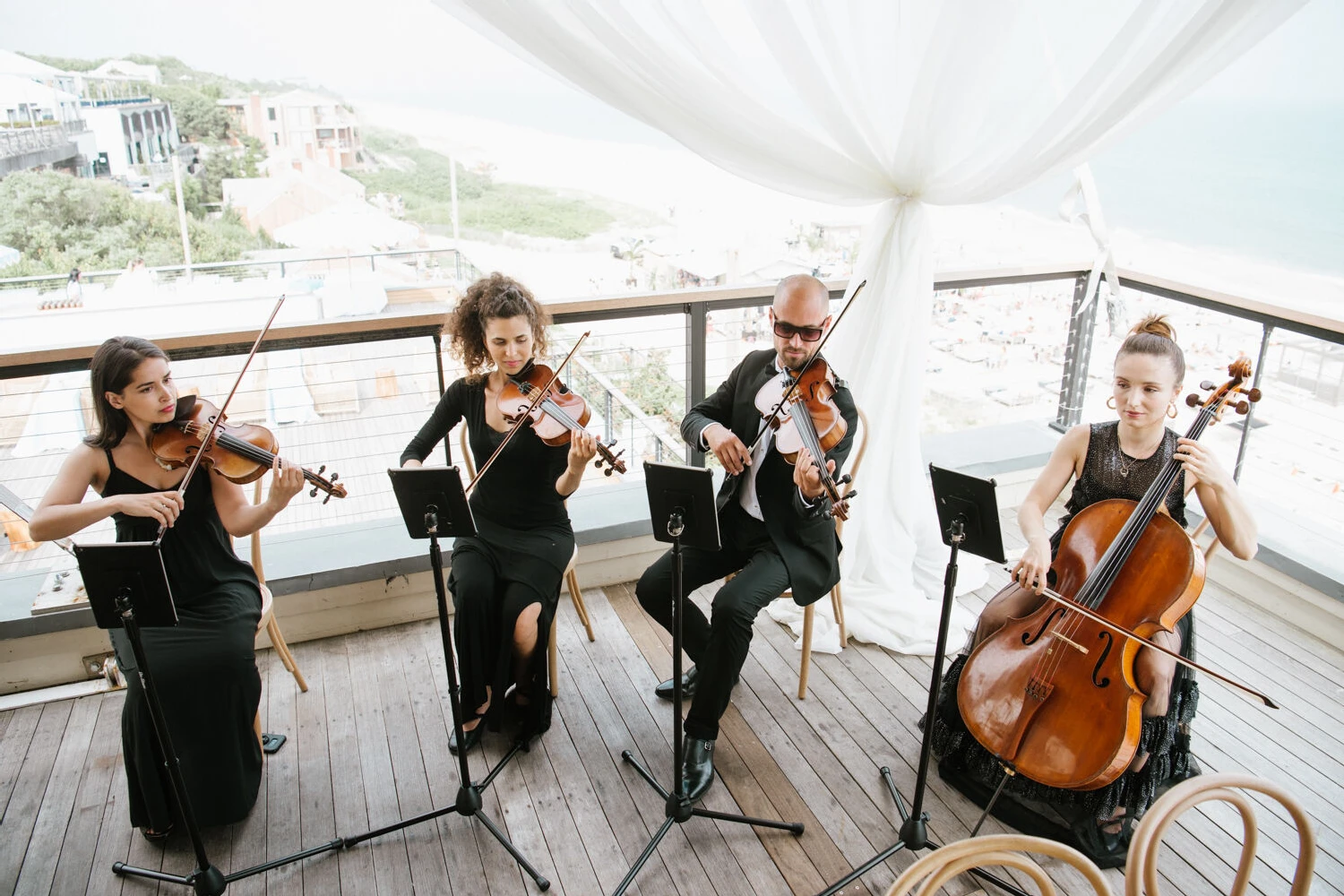 Learn more about the wedding musician from Hannah & Tyler's modern wedding