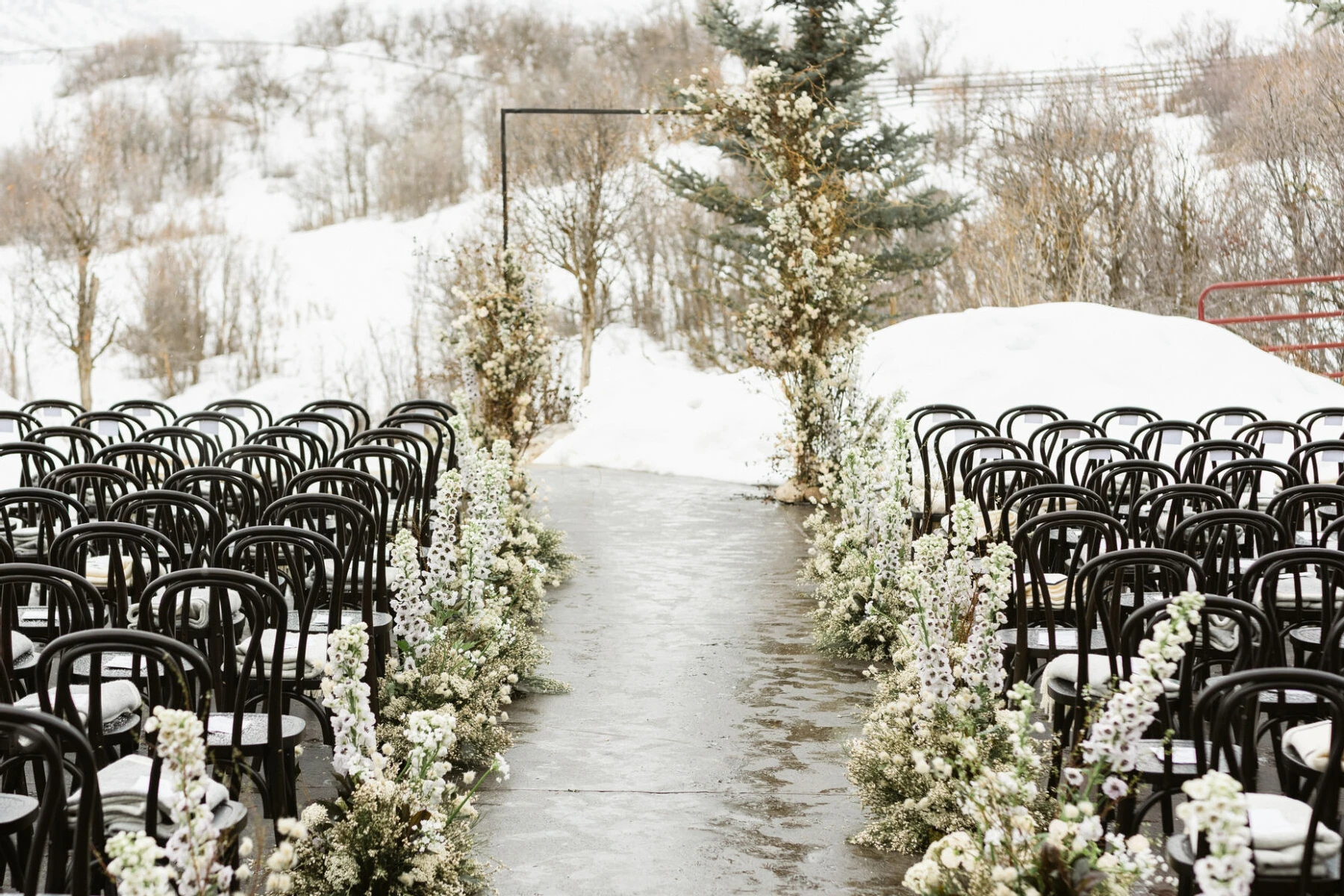 Wedding vendor: See more weddings at The Lodge at Blue Sky where this winter wedding ceremony took place.