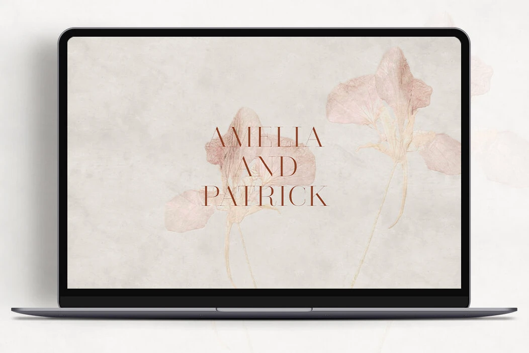 Wedding Website Examples: A desktop display of a delicate floral wedding website homepage.