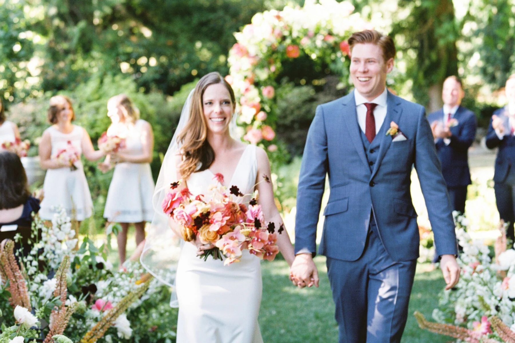 See more classic blue suit groom attire from Paige and Matthew's rustic wedding